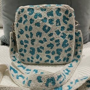 Moyna brand beaded crossbody bag